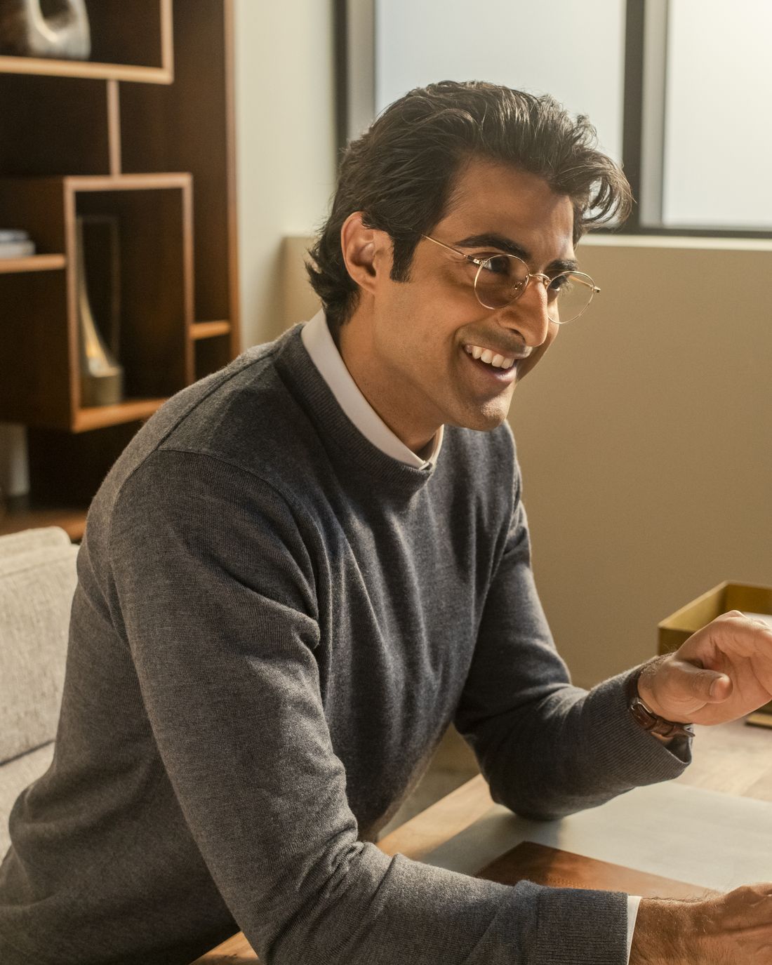 Treasurer at a desk in warm light
