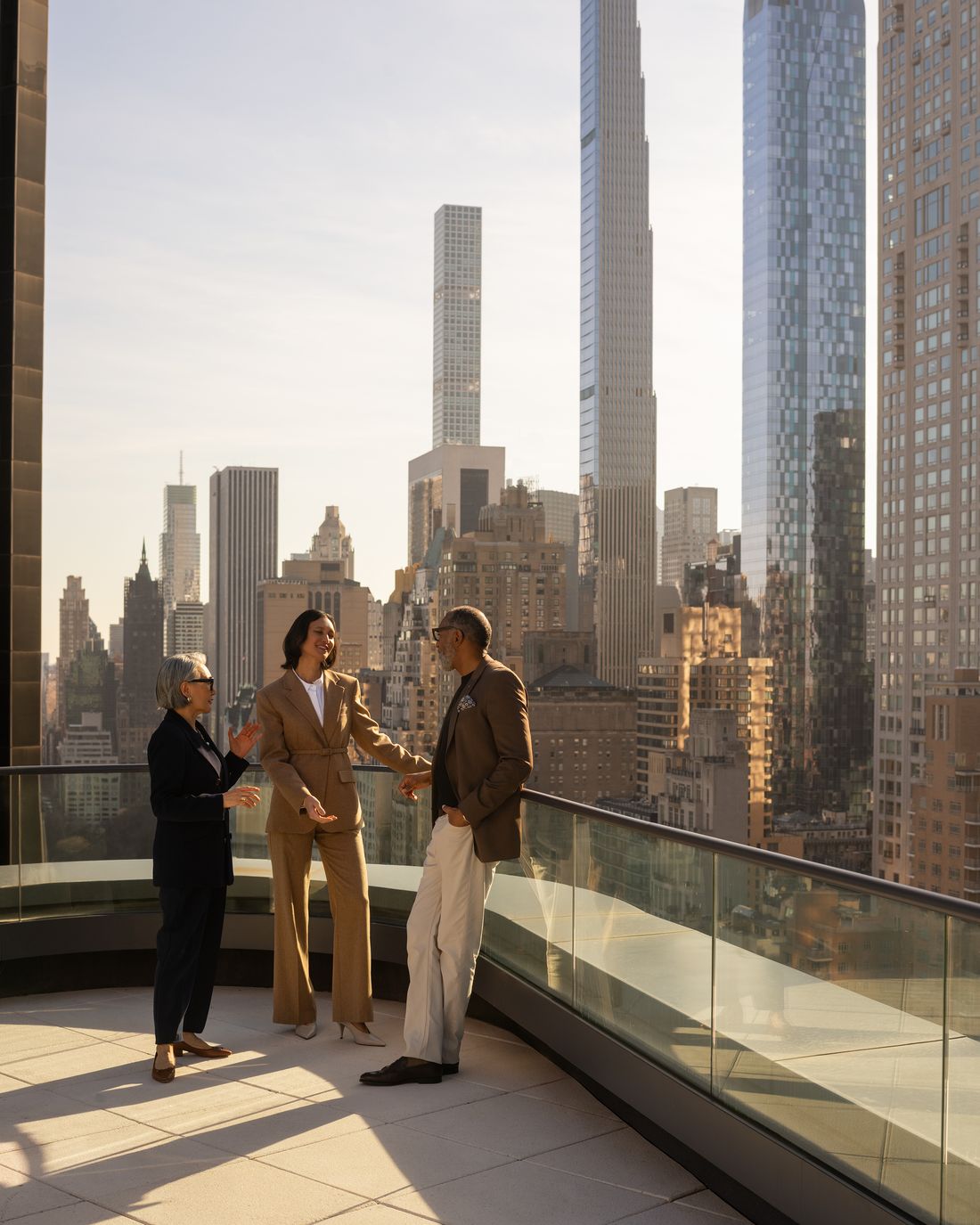 Colleagues talking on a New York terrace